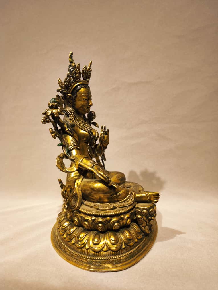 Side View of Green Tara Statue Showing Lotus Stems